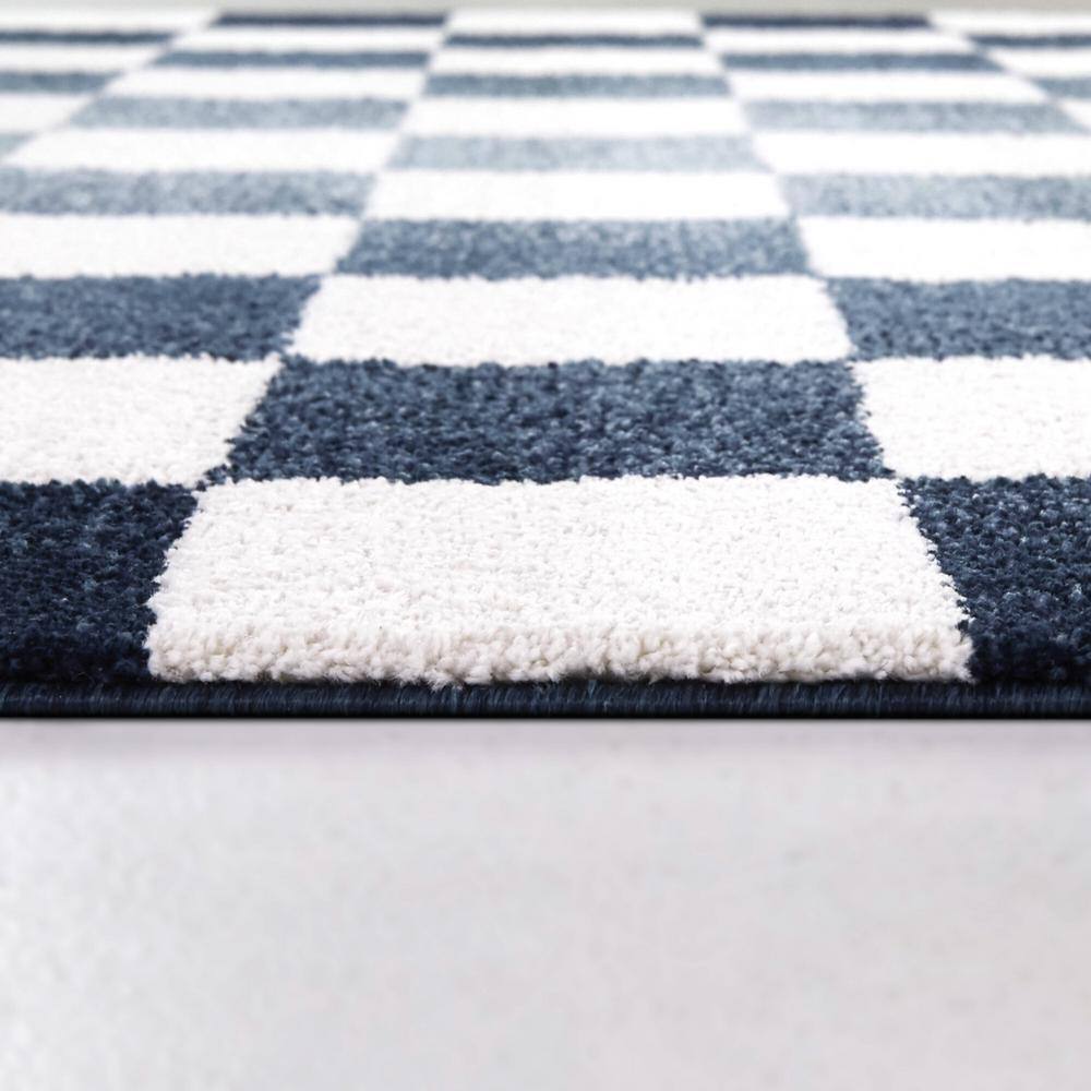 Blue and White Checkered Synthetic Area Rug 5'3" x 7'