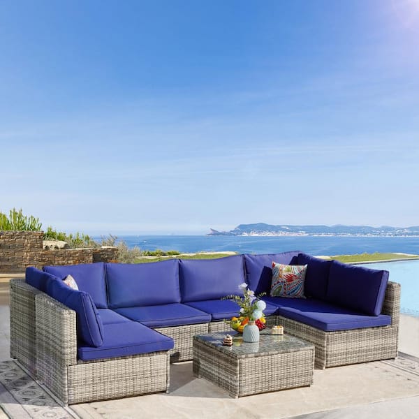 Cesicia Grey Frame 7-Piece Wicker Patio Conversation Set with Navy Blue Cushions Pillows and Glass Table