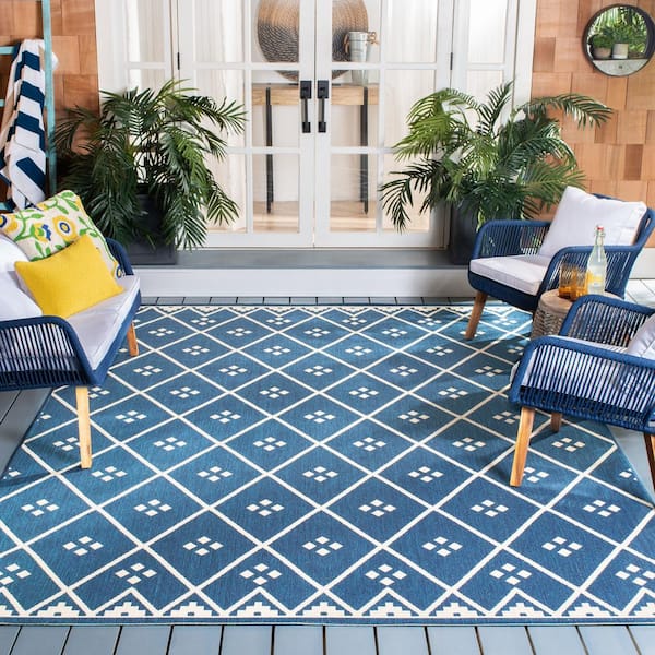 White and Blue Walk In Closet with Blue DIamond Pattern Rug - Transitional  - Closet