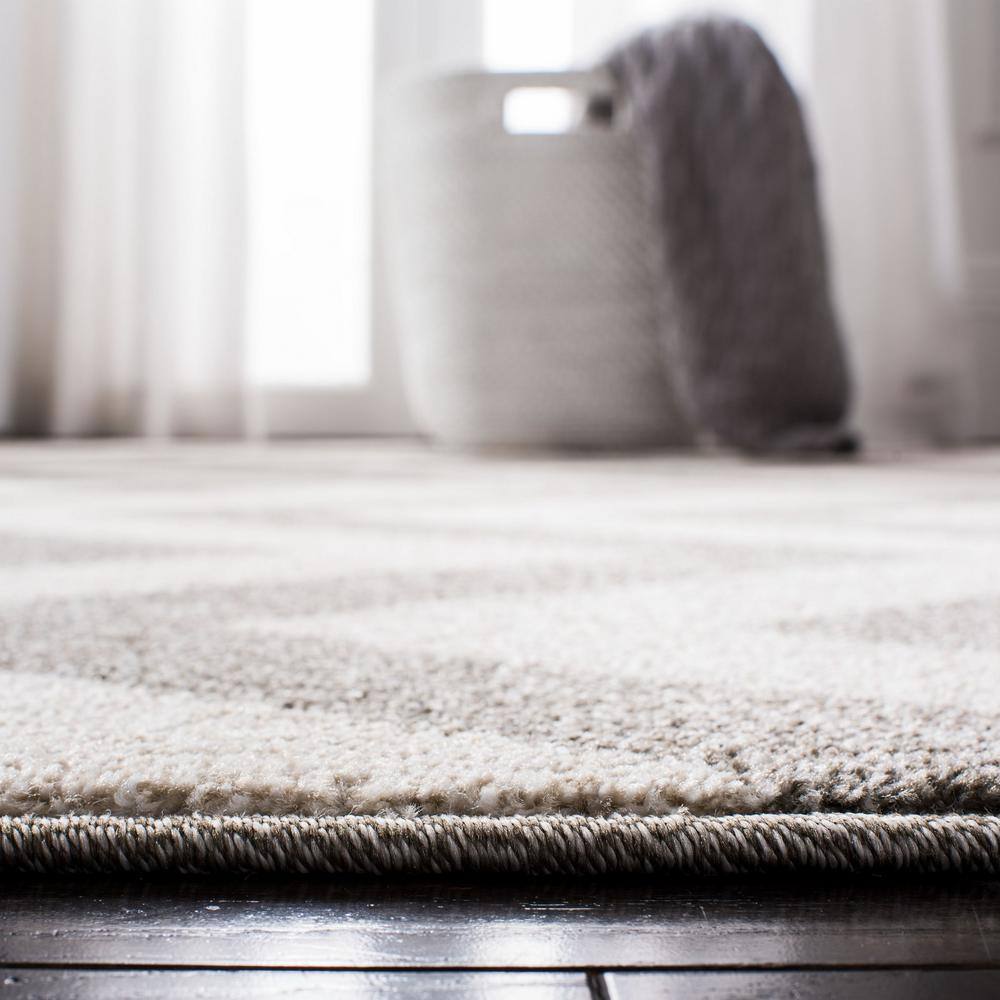 5' x 5' Dark Grey and Beige Reversible Synthetic Area Rug