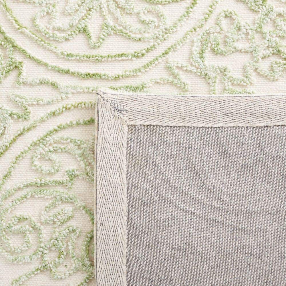 Ivory and Green 9' x 12' Handmade Tufted Wool Area Rug