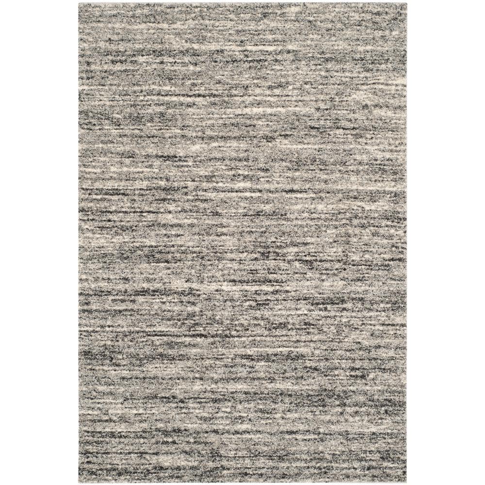 Ivory and Grey Abstract Synthetic Area Rug