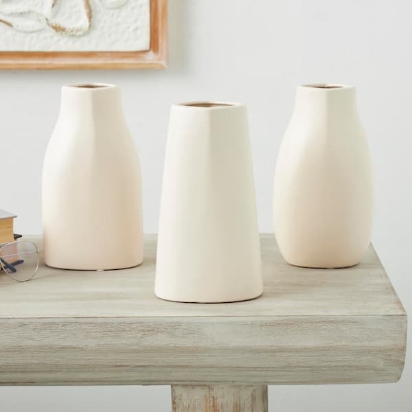 Litton Lane Cream Minimalistic Dimensional Ceramic Decorative Vase with Varying Shapes (Set of 3)