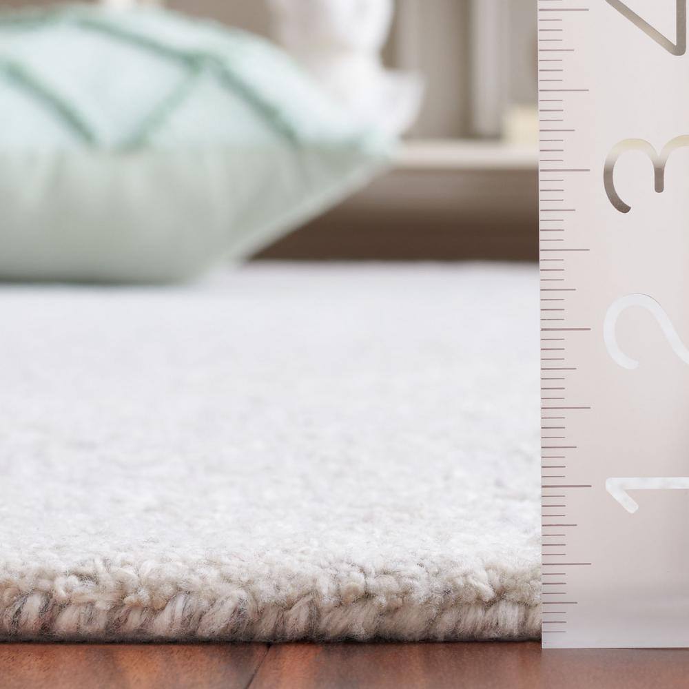 Gray and Ivory Wool Blend Handmade Tufted 8' x 10' Area Rug