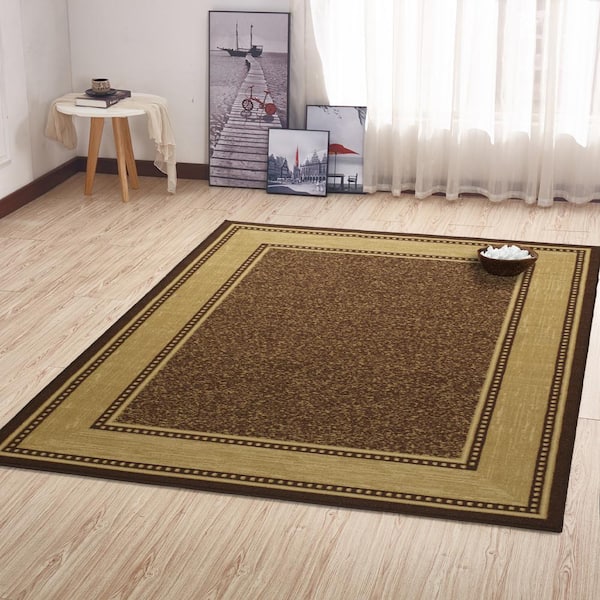 https://images.thdstatic.com/productImages/5451e0c2-67da-42f0-85f9-53835d3125c6/svn/brown-ottomanson-area-rugs-bsc3208-5x7-31_600.jpg