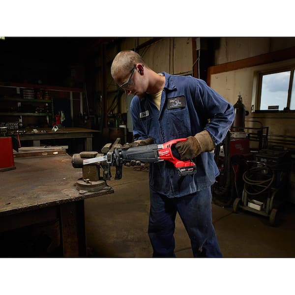 Milwaukee 9 in. 5 TPI AX Nail-Embedded Wood Cutting SAWZALL Reciprocating  Saw Blades (5-Pack) 48-00-5026S - The Home Depot