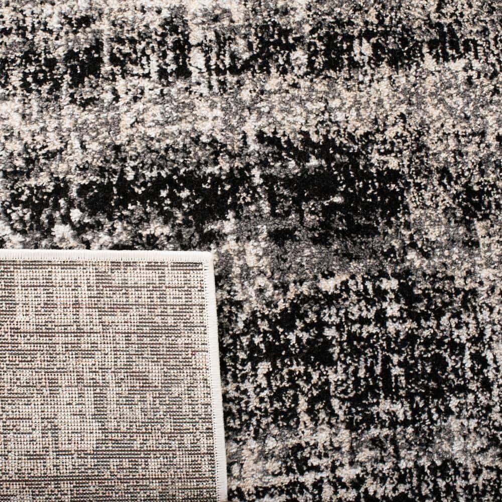 Silver and Black 6' x 9' Synthetic Rectangular Area Rug