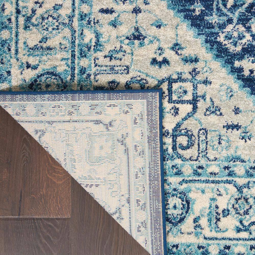 Ivory and Navy Synthetic 5' x 7' Rectangular Area Rug