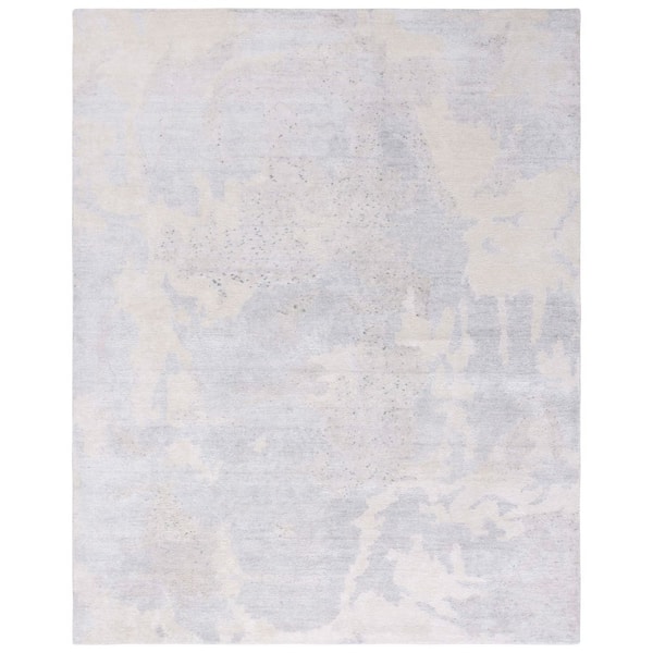 Tibetan 9 ft. x 12 ft. Light Blue Abstract Area Rug