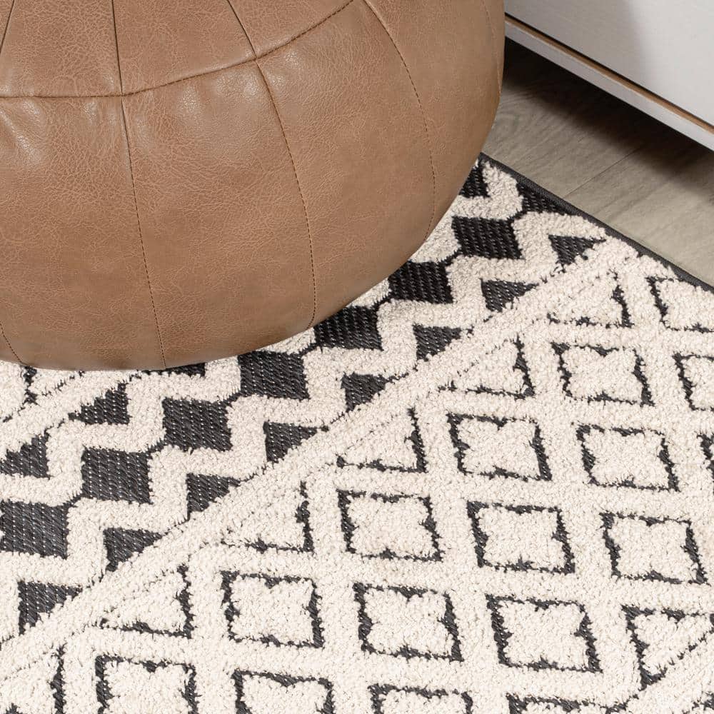Cream and Black Geometric Synthetic Indoor/Outdoor Area Rug