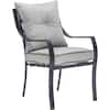 A grey cushioned chair from the Hanover Lavallette patio dining set.