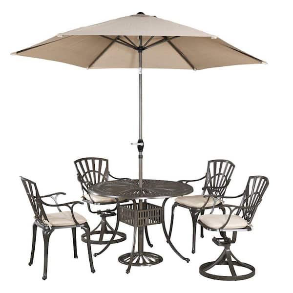HOMESTYLES Grenada Taupe Tan 42 in. 5-Piece Cast Aluminum Round Outdoor Dining Set with Umbrella with Natural Tan Cushions