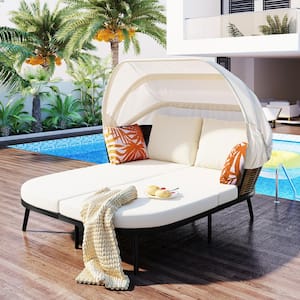 Gray Wicker Outdoor Day Bed with Beige Cushions, Pillows and Retractable Canopy