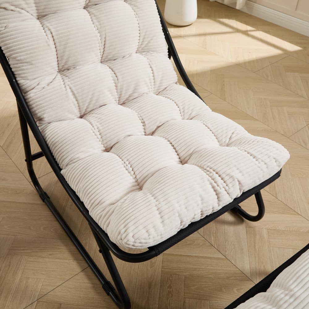 Close-up of the puffy white corduroy cushion on the recliner.