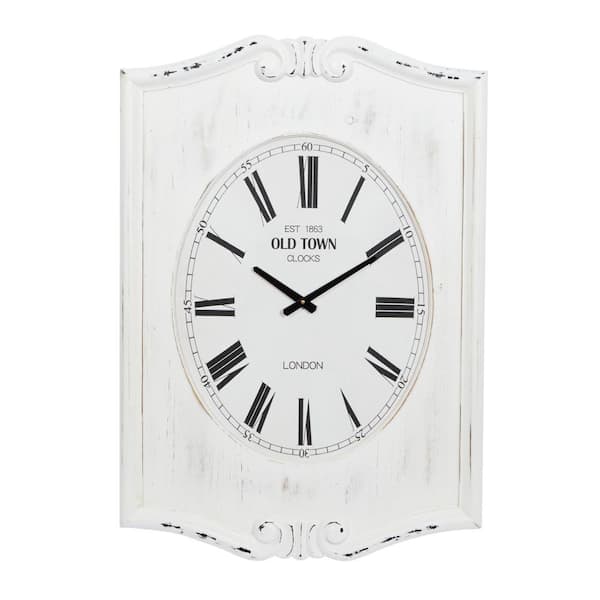 Litton Lane 22 in. x 31 in. White Wood Carved Distressed Floral Wall Clock