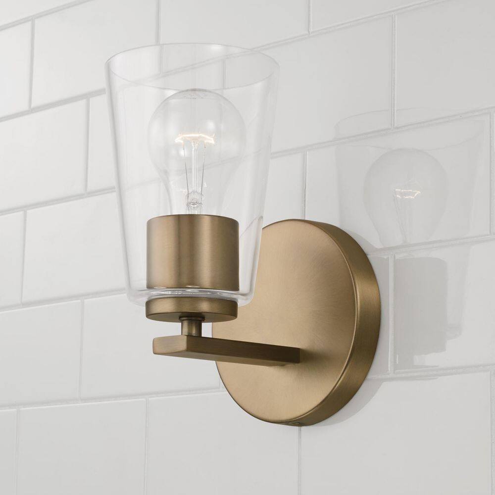 Aged Brass Dimmable Sconce with Clear Glass Shade