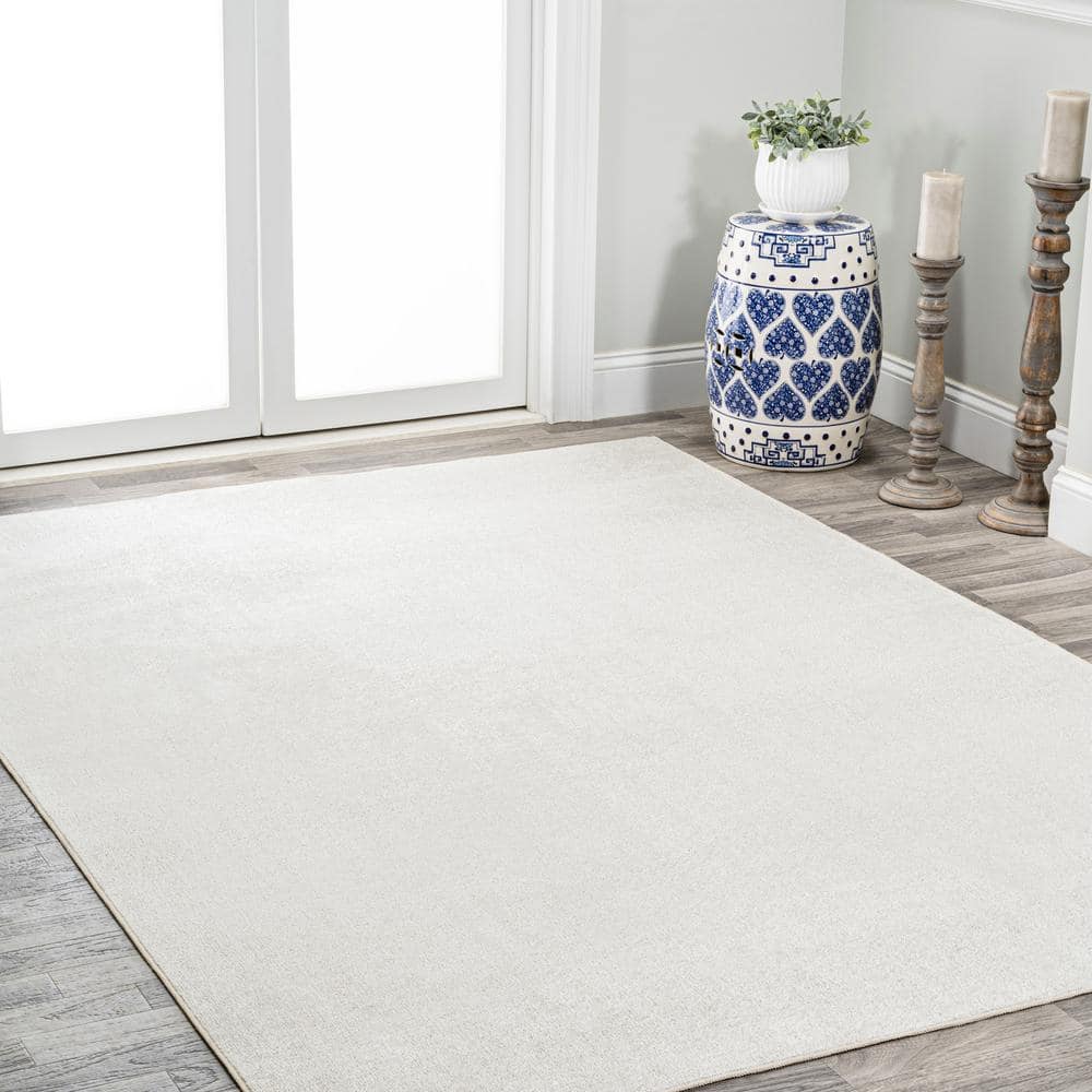 Cream 4' x 6' Synthetic Washable Rectangular Area Rug