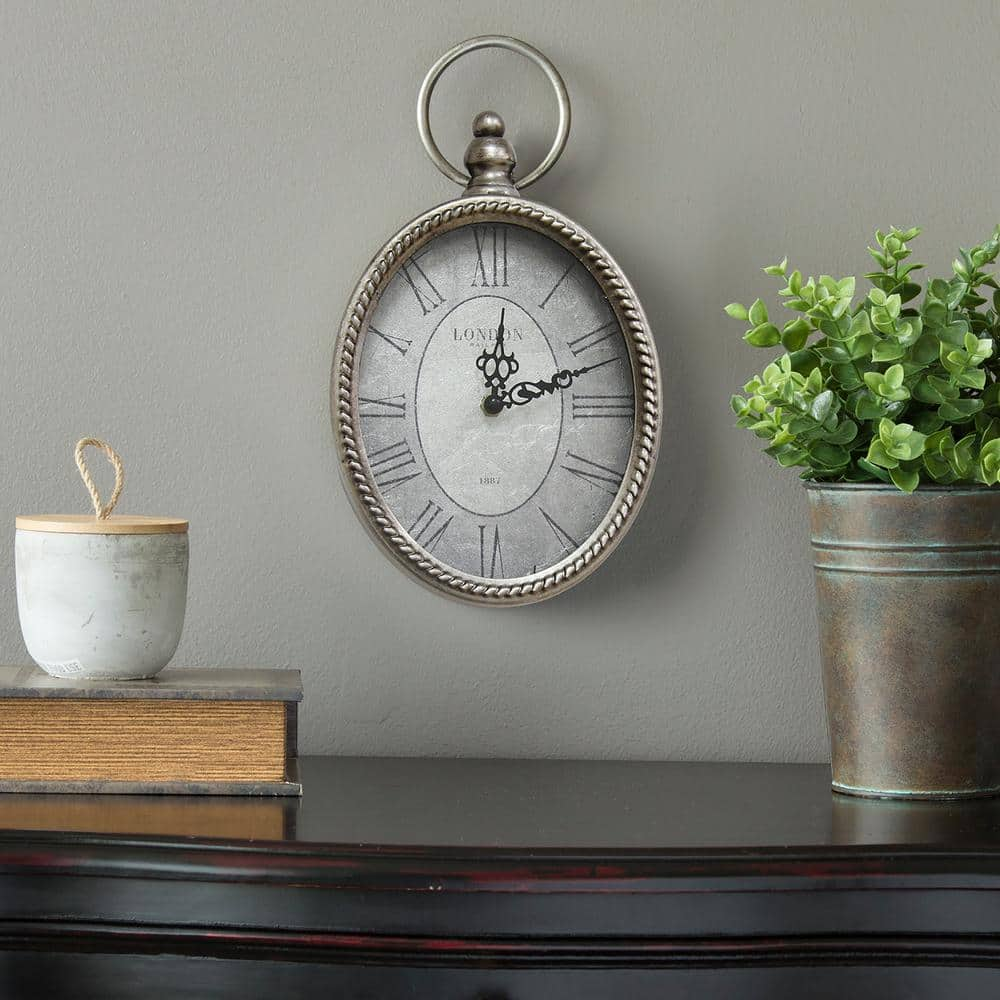 Stratton Home Decor Antique Silver Oval Wall Clock S09595 The Home Depot