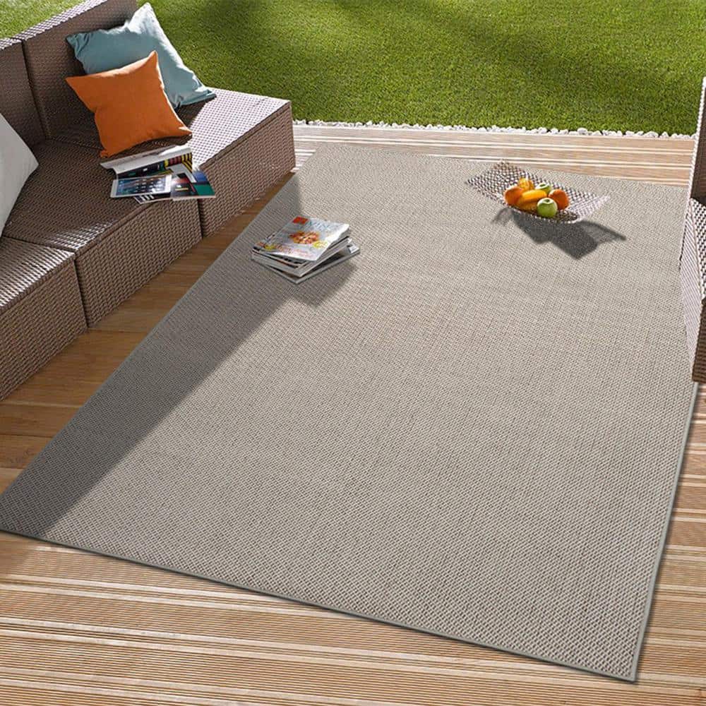 Ivory 5' x 7' Synthetic Flat Woven Reversible Rug
