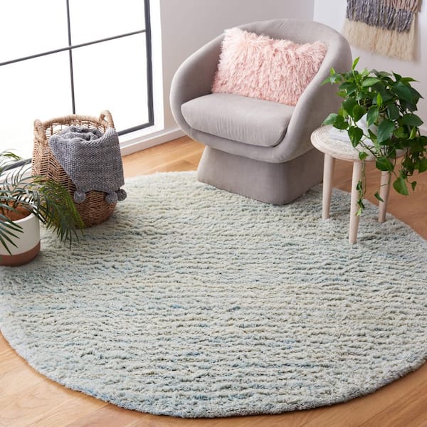 Casablanca 6 ft. x 6 ft. Light Blue Solid Color Flokati Round Area Rug
