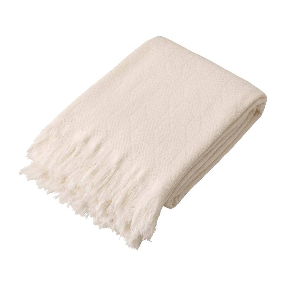 white cotton throw blanket