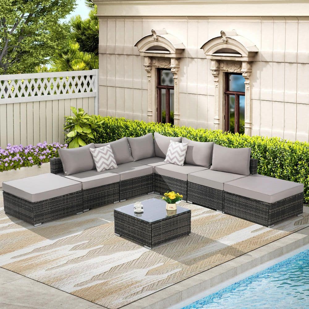 8-Piece Wicker Outdoor Sectional Set with Light Gray Cushions and Coffee Ta