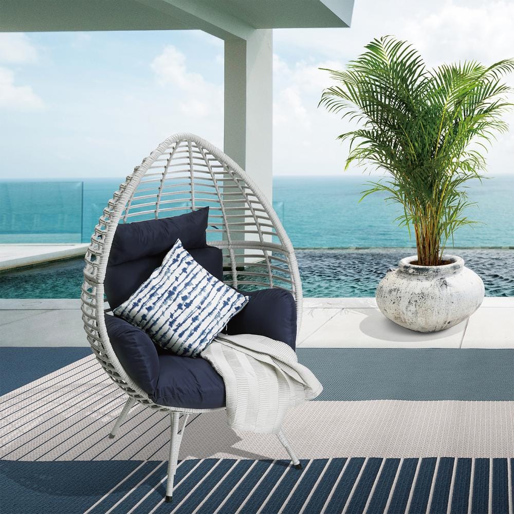 outdoor chairs with blue cushions