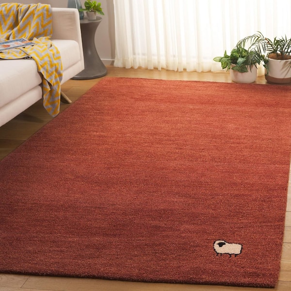 Himalaya 4 ft. x 6 ft. Rust Solid Sheep Area Rug