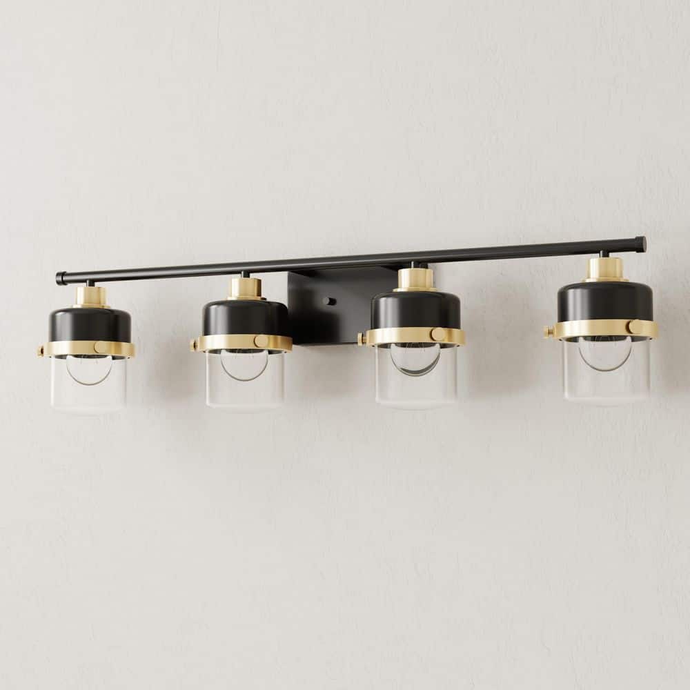 Beckner Collection 33.75 in. 4-Light Matte Black Clear Glass Urban Industrial Vanity Light with Vintage Brass Accents price history on PriceWatchPro