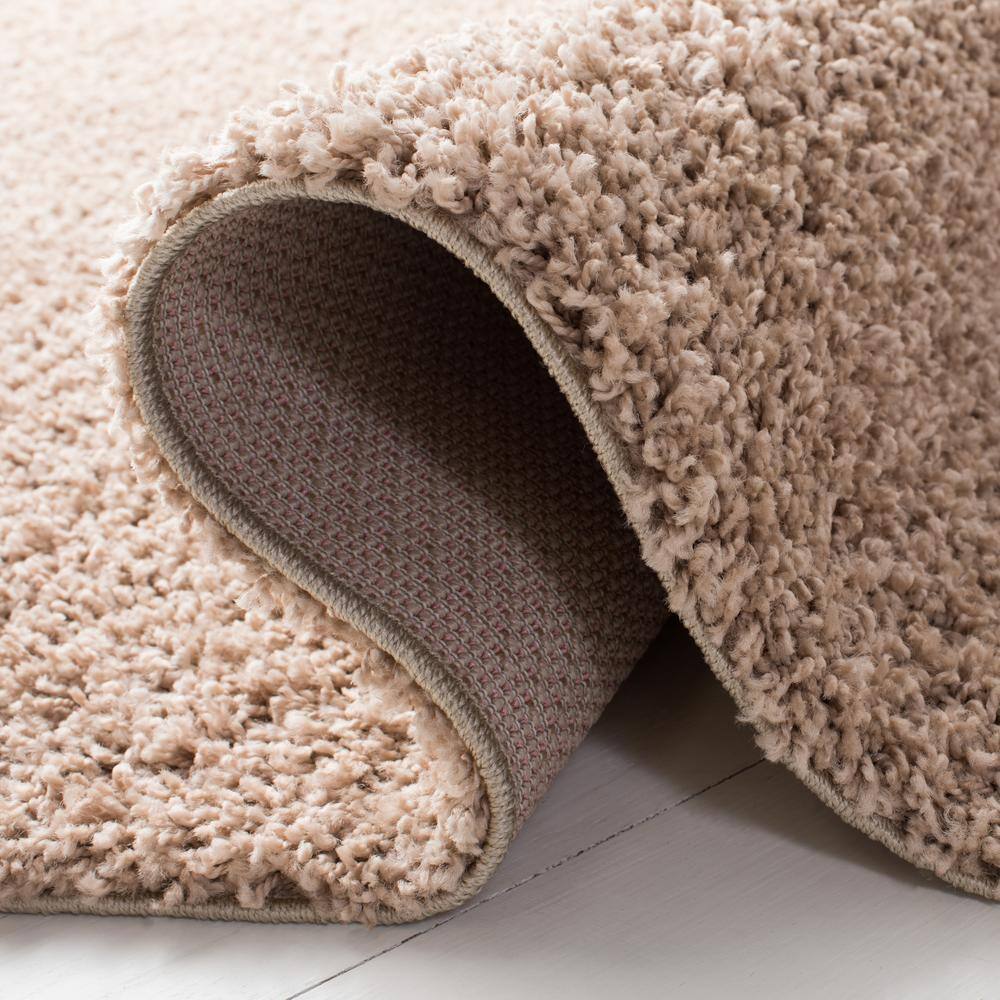 Beige 5'3" x 7'6" Synthetic Shag Area Rug