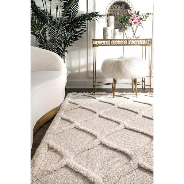 https://images.thdstatic.com/productImages/559d7889-1a01-4b5d-b520-5769a1c9eca5/svn/ivory-nuloom-kids-rugs-ozld01a-53076-40_600.jpg