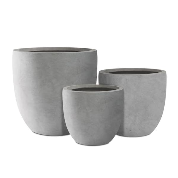 https://images.thdstatic.com/productImages/55a5f1a4-f994-4d01-9d12-e5a25cfb2588/svn/natural-concrete-kante-plant-pots-rc0050abc-c80021-64_600.jpg