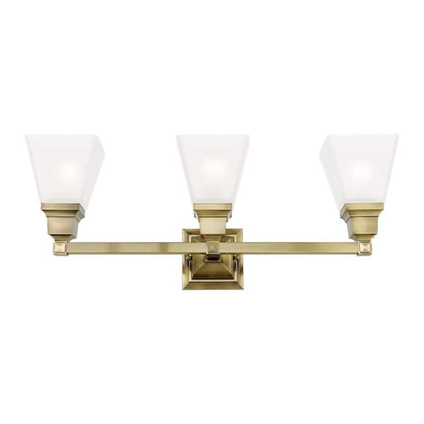 Livex Lighting Chadbdurne 25.25 in. 3-Light Antique Brass Vanity Light with Satin Glass