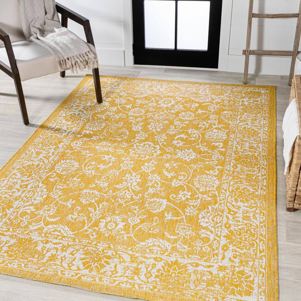 9' x 12' Yellow and Cream Floral Synthetic Rectangular Rug
