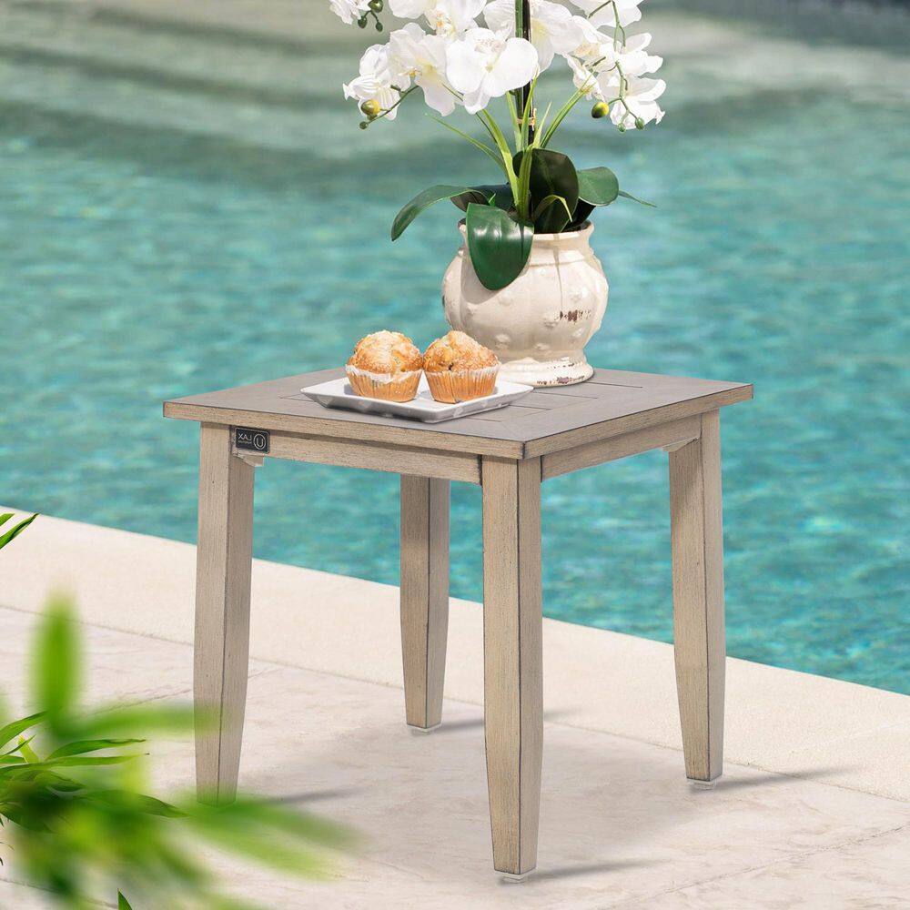 Hamarto outdoor square side table in driftwood finish.