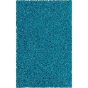 Solid Shag Turquoise 5' 1 x 8' 0 Area Rug