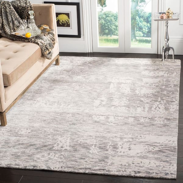 Tibetan 10 ft. x 14 ft. Silver Distressed Area Rug
