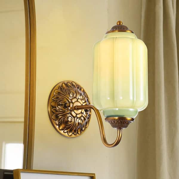 Amia 5.9 in. 1-Light French Country Brass Cylinder Wall Sconce with Jade Green Pumpkin Glass Shade