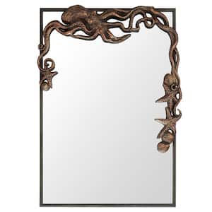 Octopus Design 20 in. W x 29 in. H Cast Iron Wall Mirror