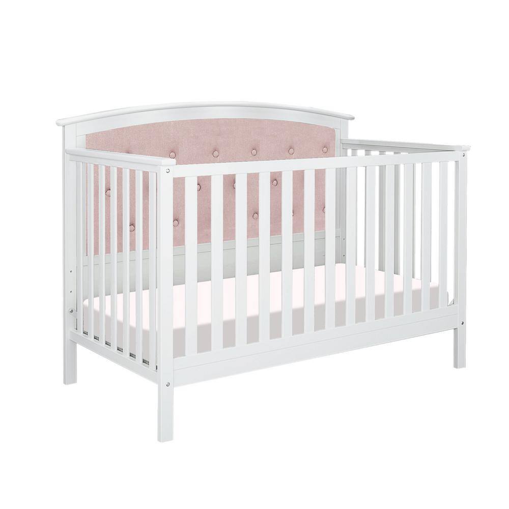pink tufted crib