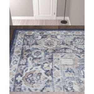10' Blue and Ivory Floral Power Loom Distressed Washable Runner Rug