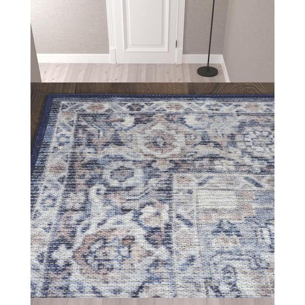 10 ft. Blue and Ivory Floral Power Loom Distressed Washable Runner Rug