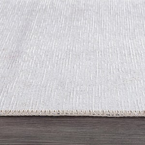 Cream 7 ft. 7 in. x 9 ft. 6 in. Contemporary Solid Machine Washable Area Rug