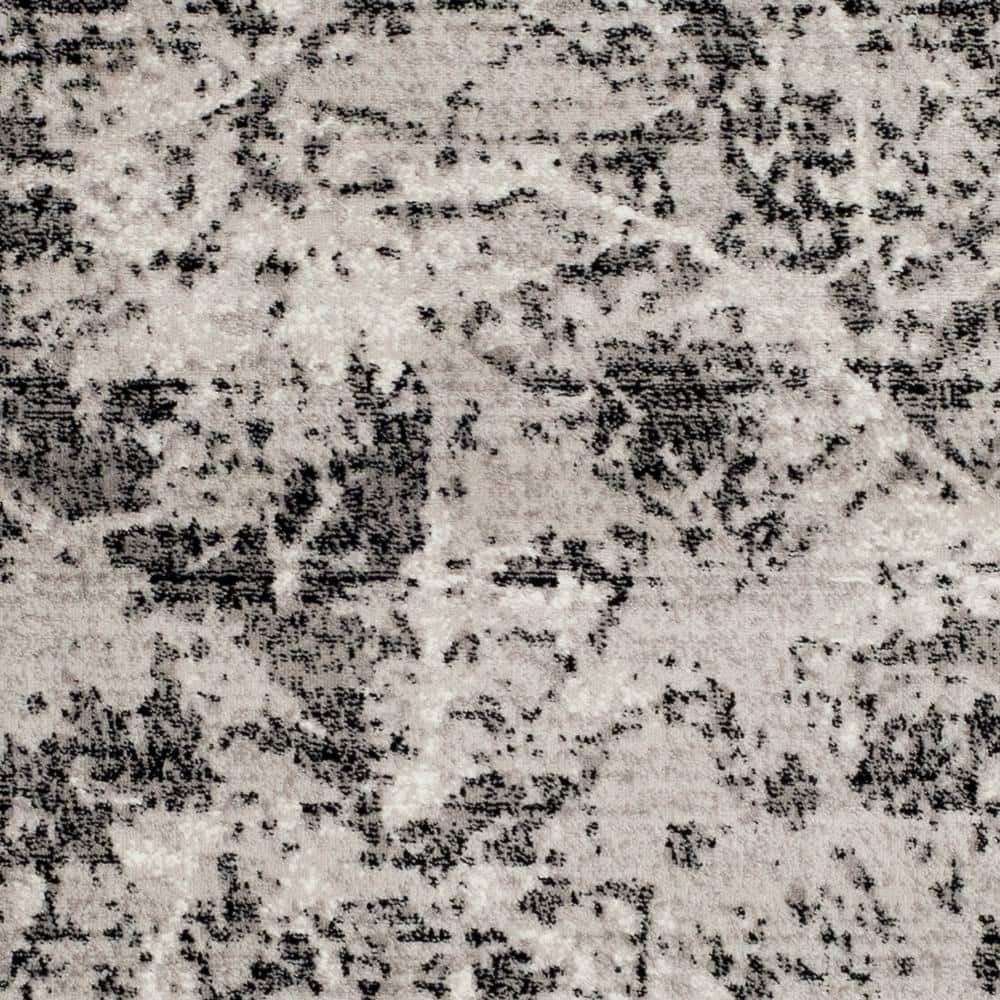 Charcoal and Ivory Abstract Synthetic 5'1" x 7'6" Reversible Area Rug