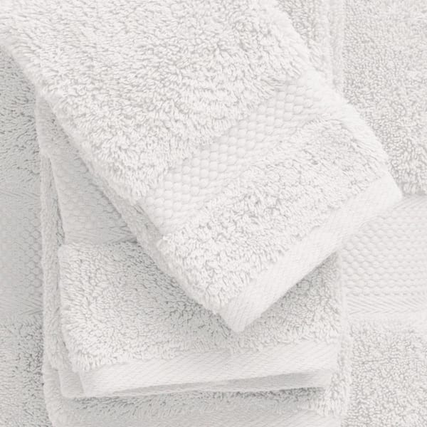 https://images.thdstatic.com/productImages/562a3065-0d33-4428-8170-b1ec716fd726/svn/white-the-company-store-bath-towels-vj94-bsh-white-a0_600.jpg