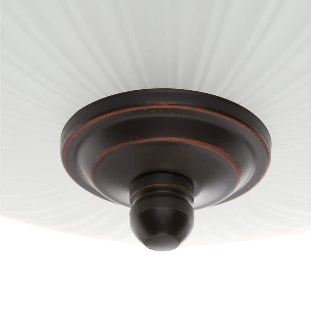Traditional Globe LED Flushmount in Oil Rubbed Bronze with Frosted Glass