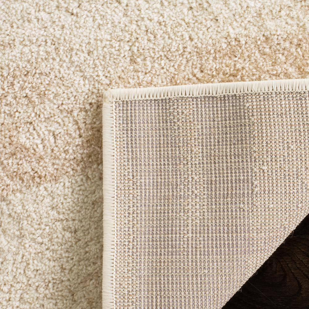 Cream and Champagne Abstract Rectangular 9' x 12' Area Rug