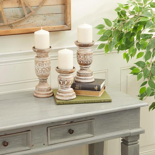 Litton Lane Beige Wood Handmade Candle Holder with Carved Designs (Set of 3)