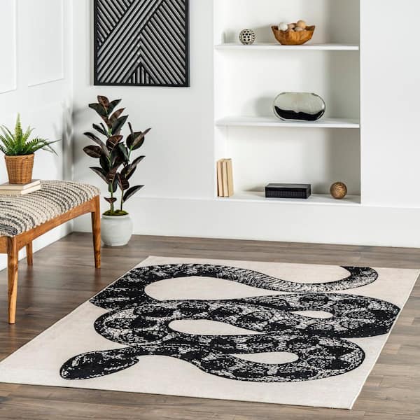 https://images.thdstatic.com/productImages/568bbe43-99c2-52f7-a49a-1aac1f223910/svn/black-nuloom-area-rugs-hjau52a-8010-e1_600.jpg