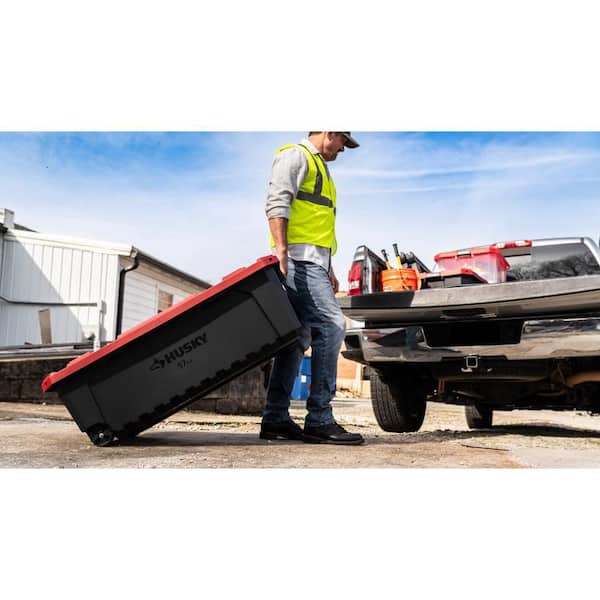 Husky 57 Gal. Pro Grip Storage Tote with Wheels in Black with Red